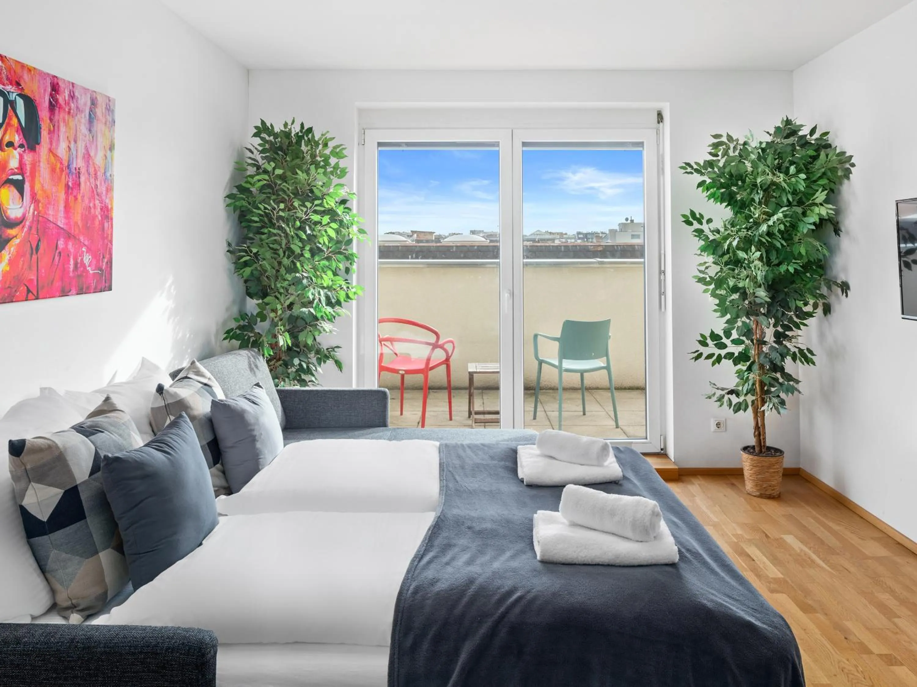 Bed in Penthouse Apartments