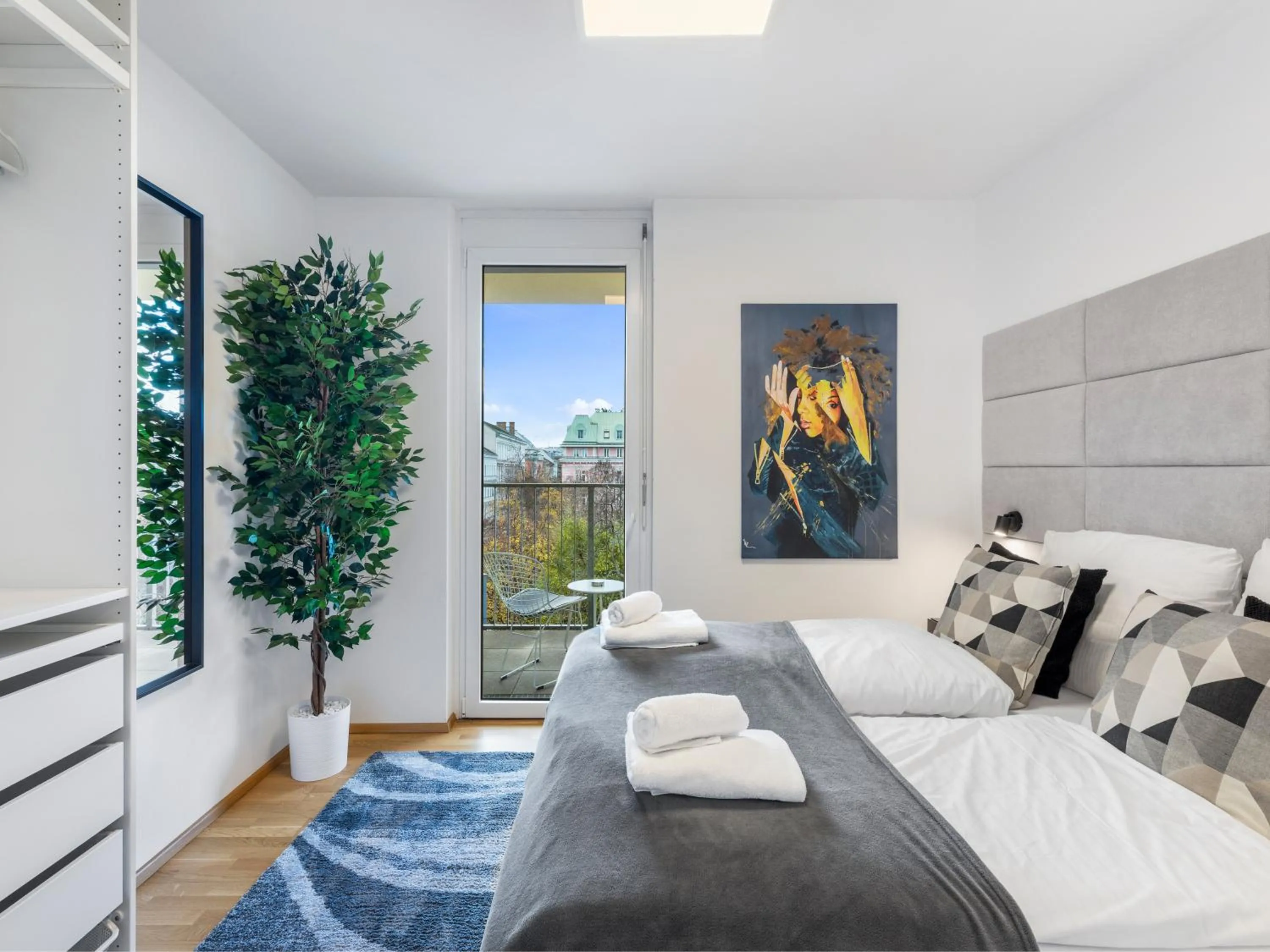 Bed in Penthouse Apartments