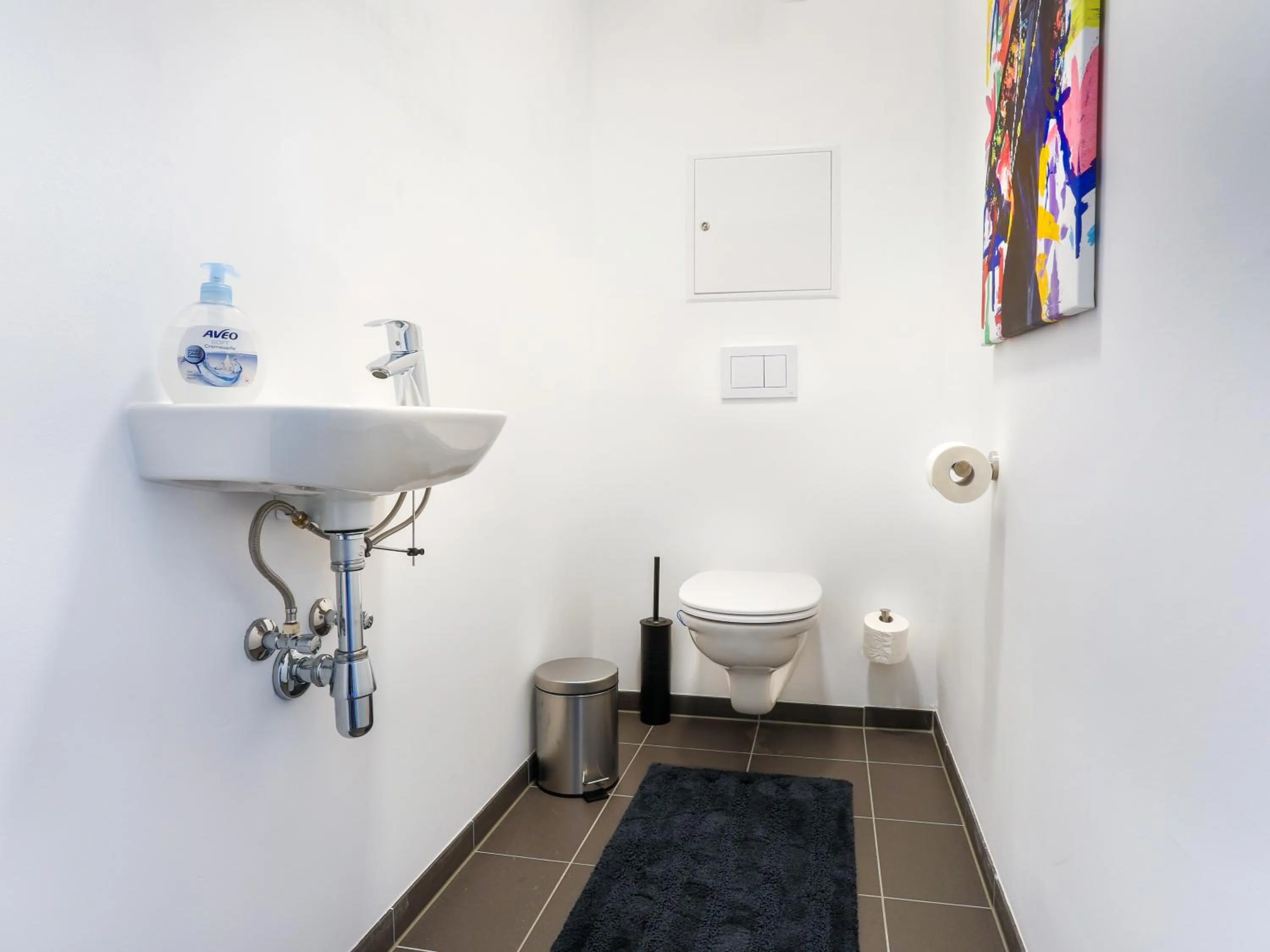 Toilet in Penthouse Apartments