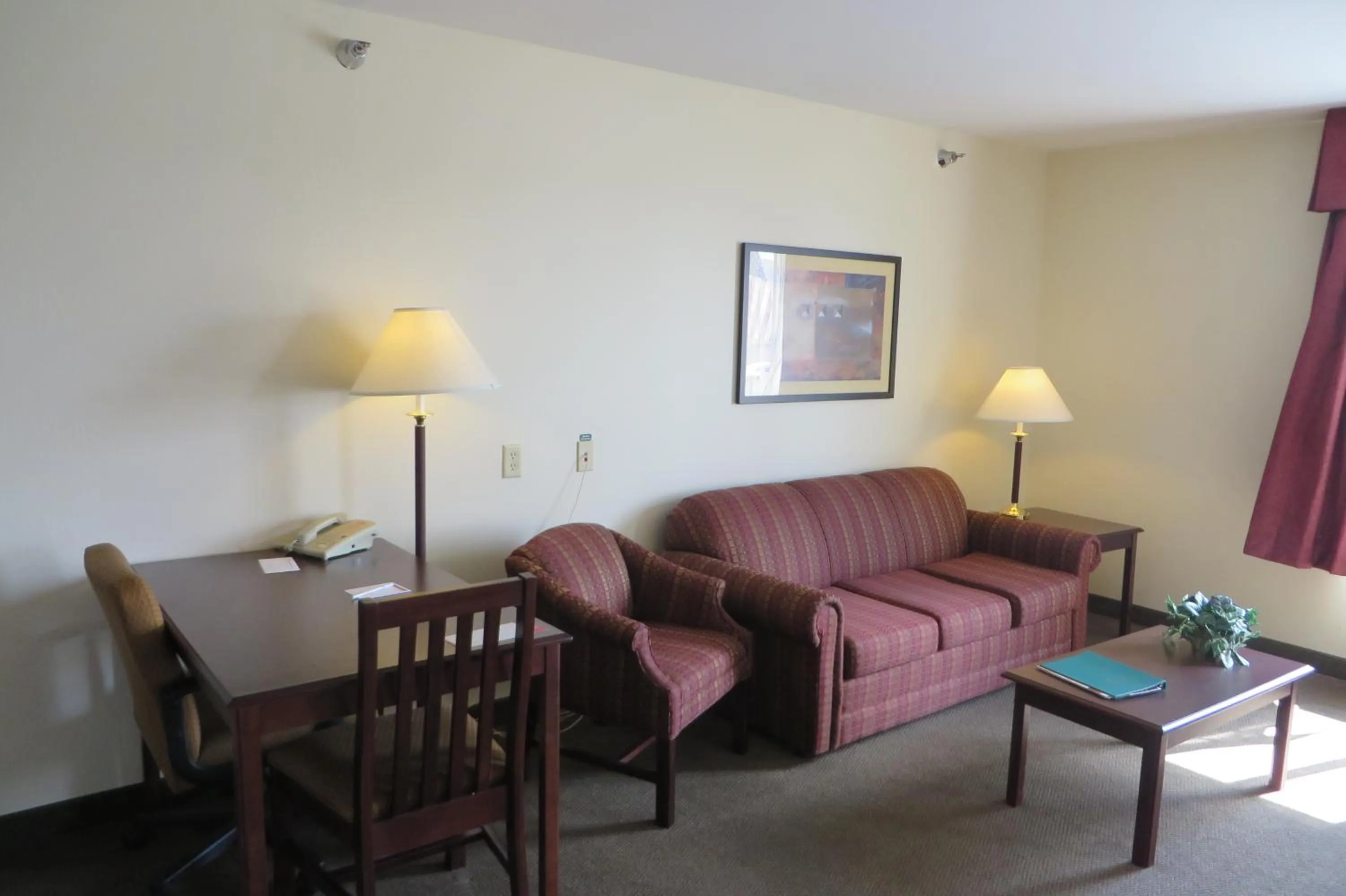 Living room in Hawthorn Extended Stay by Wyndham Seville