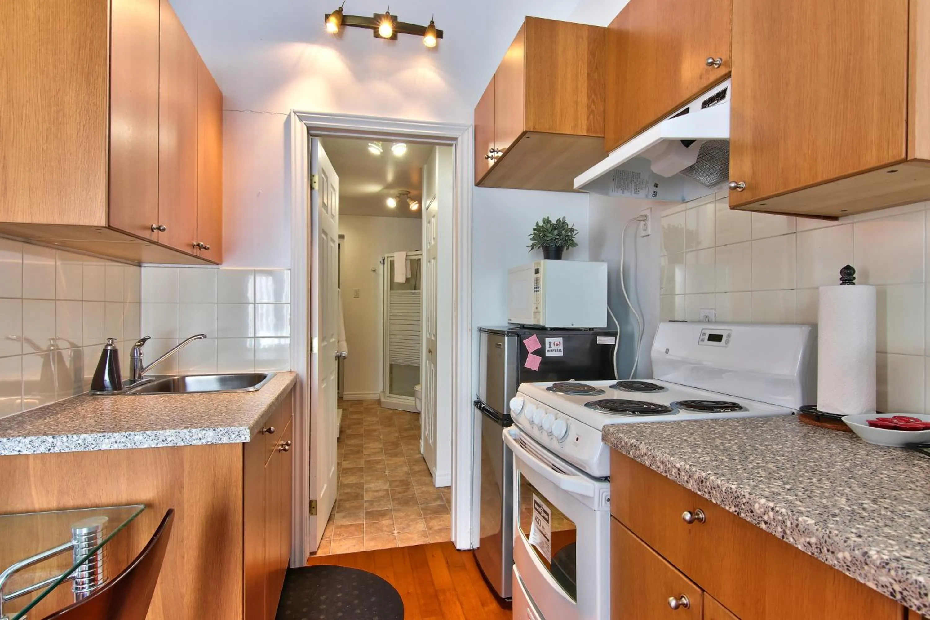 Kitchen or kitchenette in Apartment et Studio montreal