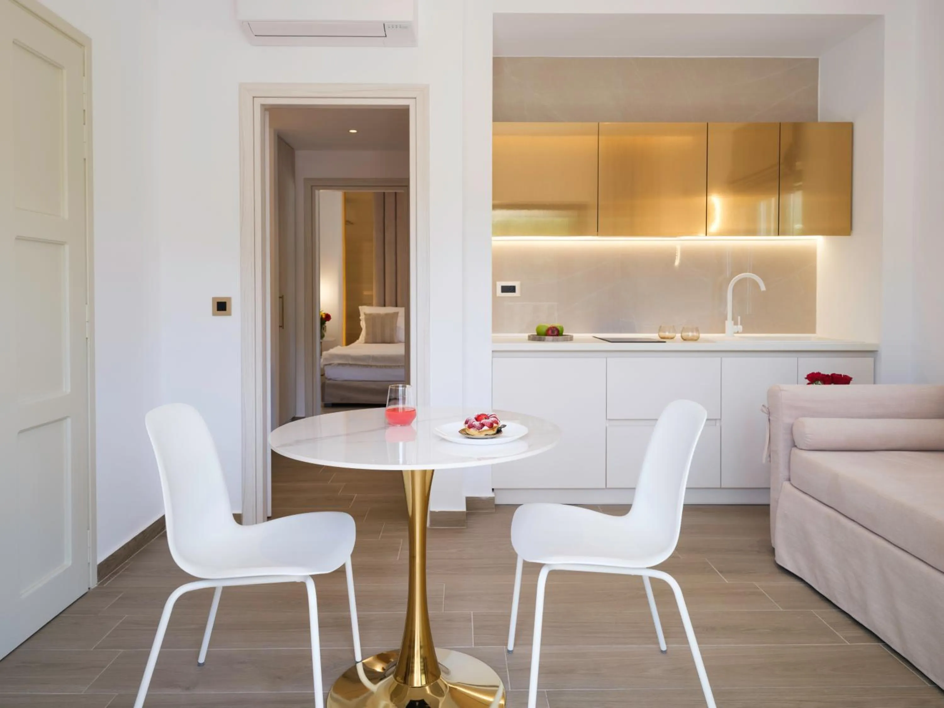 Bed in Golden Luxury Suites