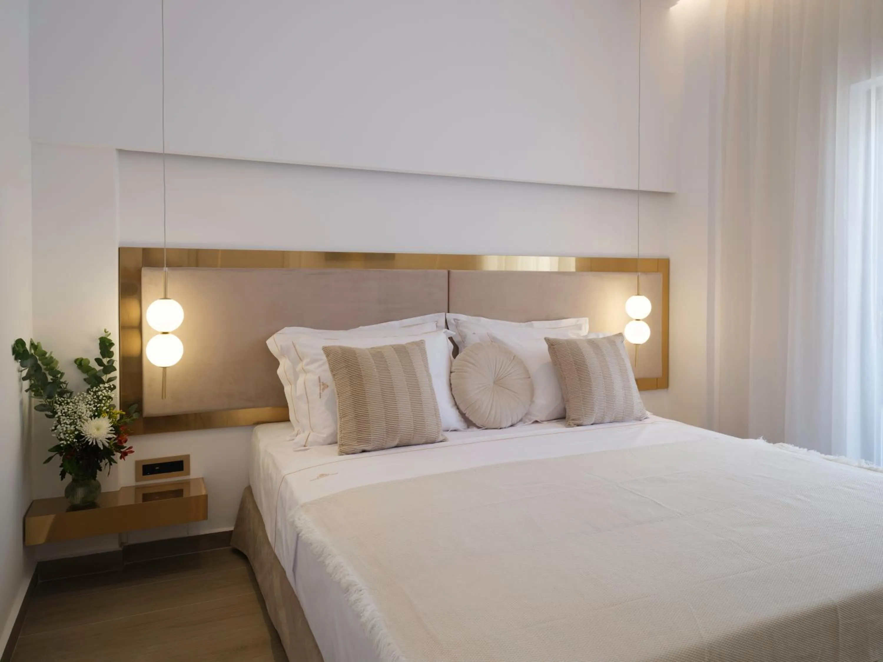 Bed in Golden Luxury Suites