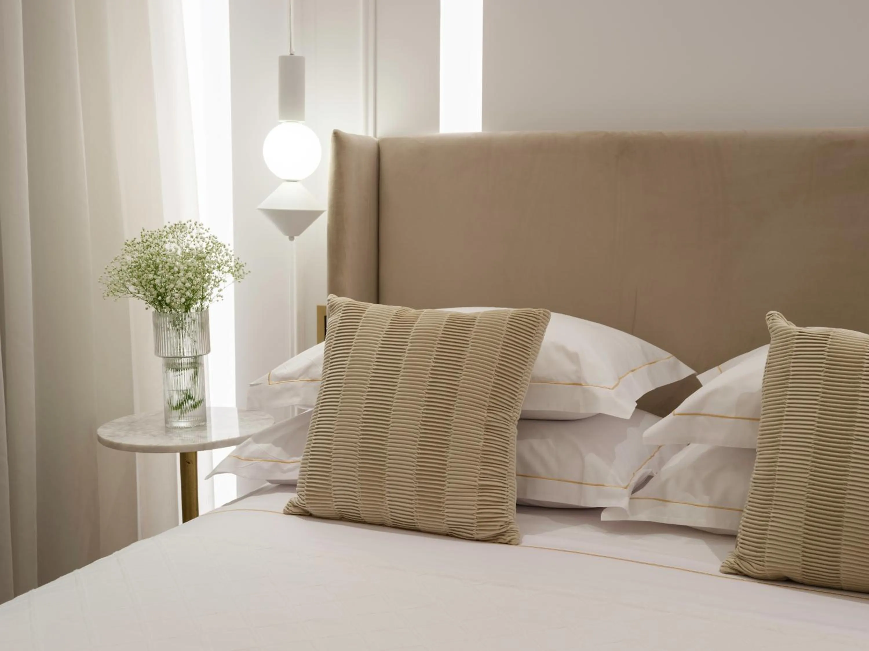 Bed in Golden Luxury Suites