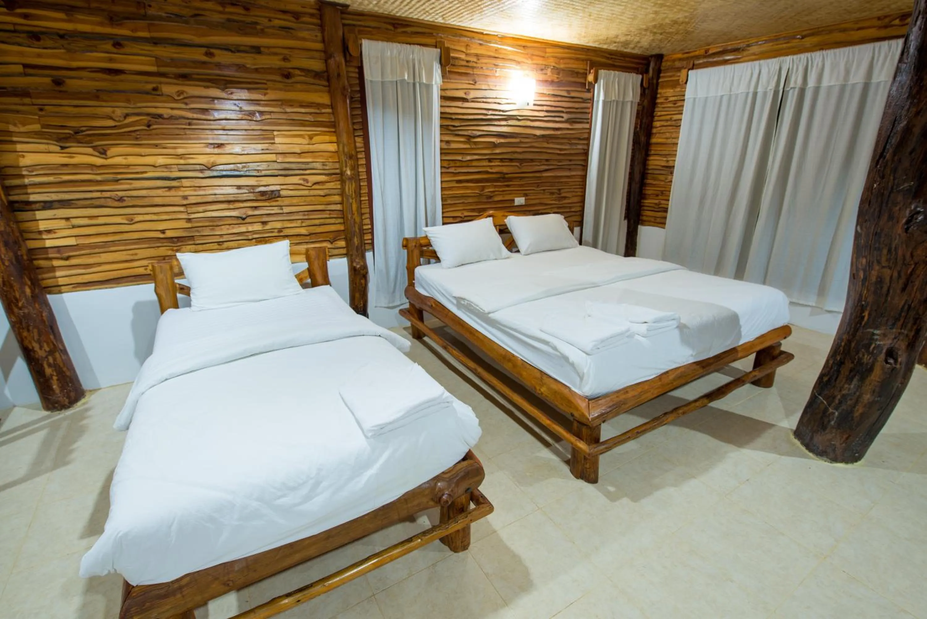Bed in Panya Garden Resort