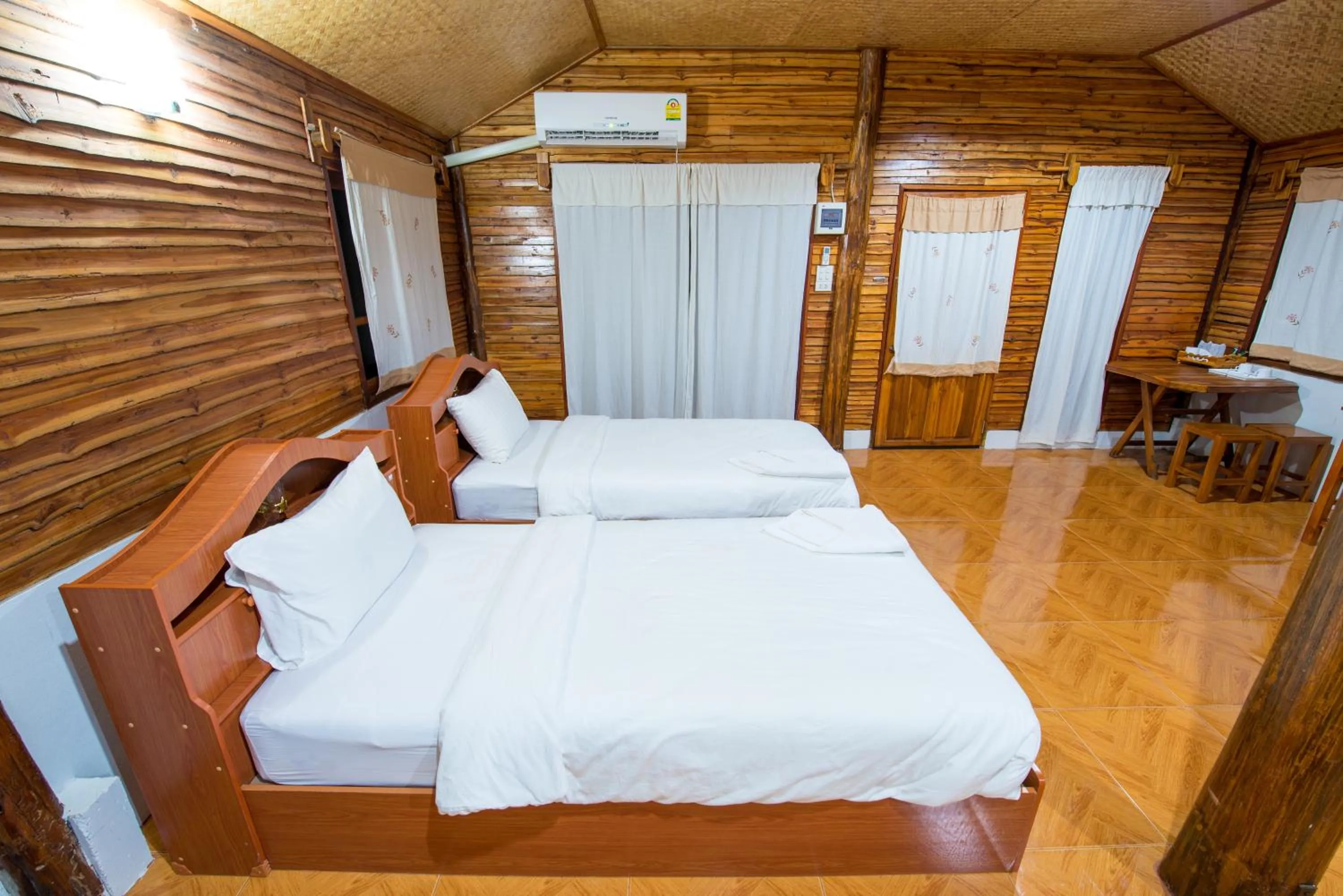 Bed in Panya Garden Resort