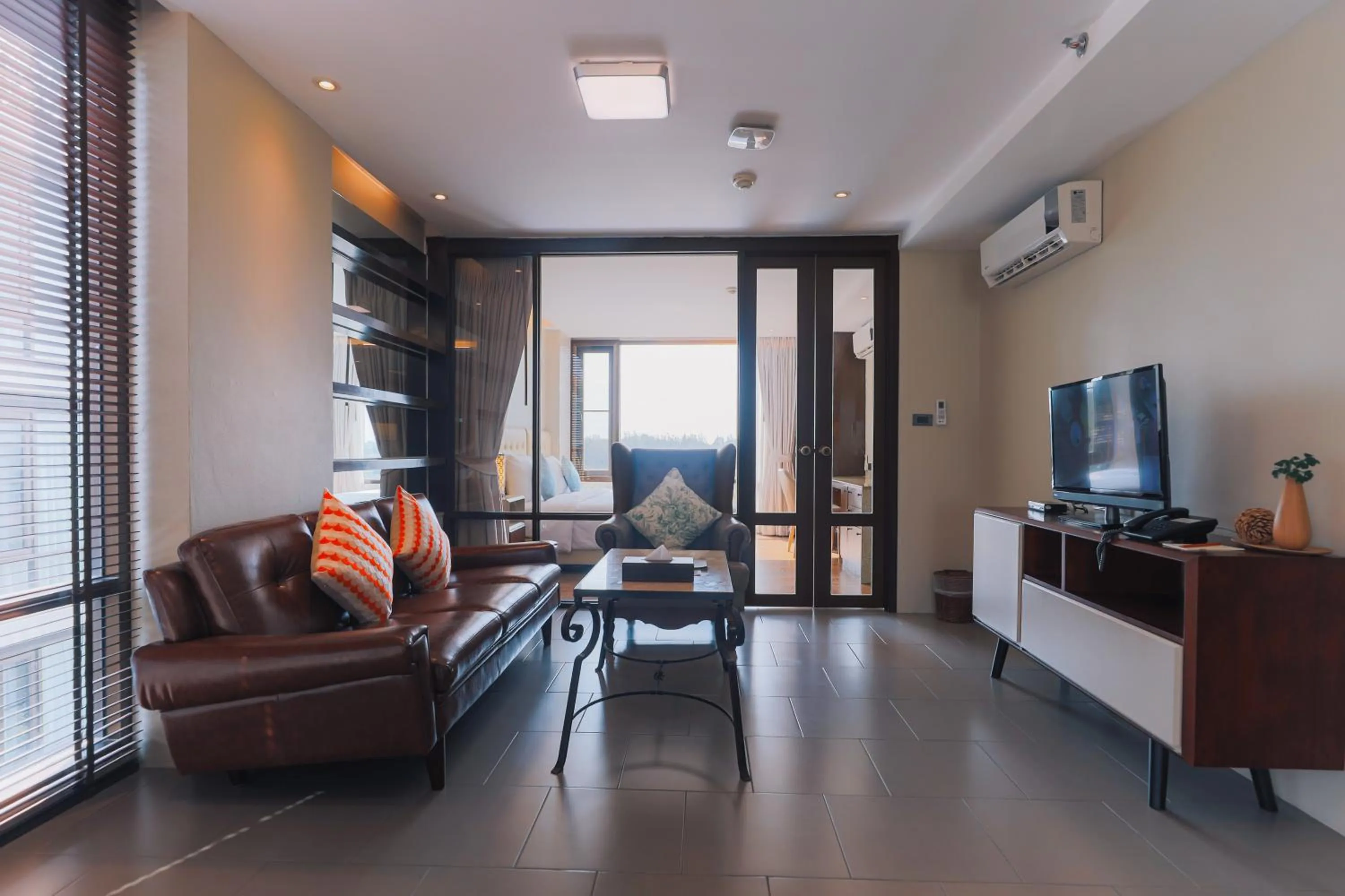 TV and multimedia in Balcony Courtyard Sriracha Hotel & Serviced Apartments