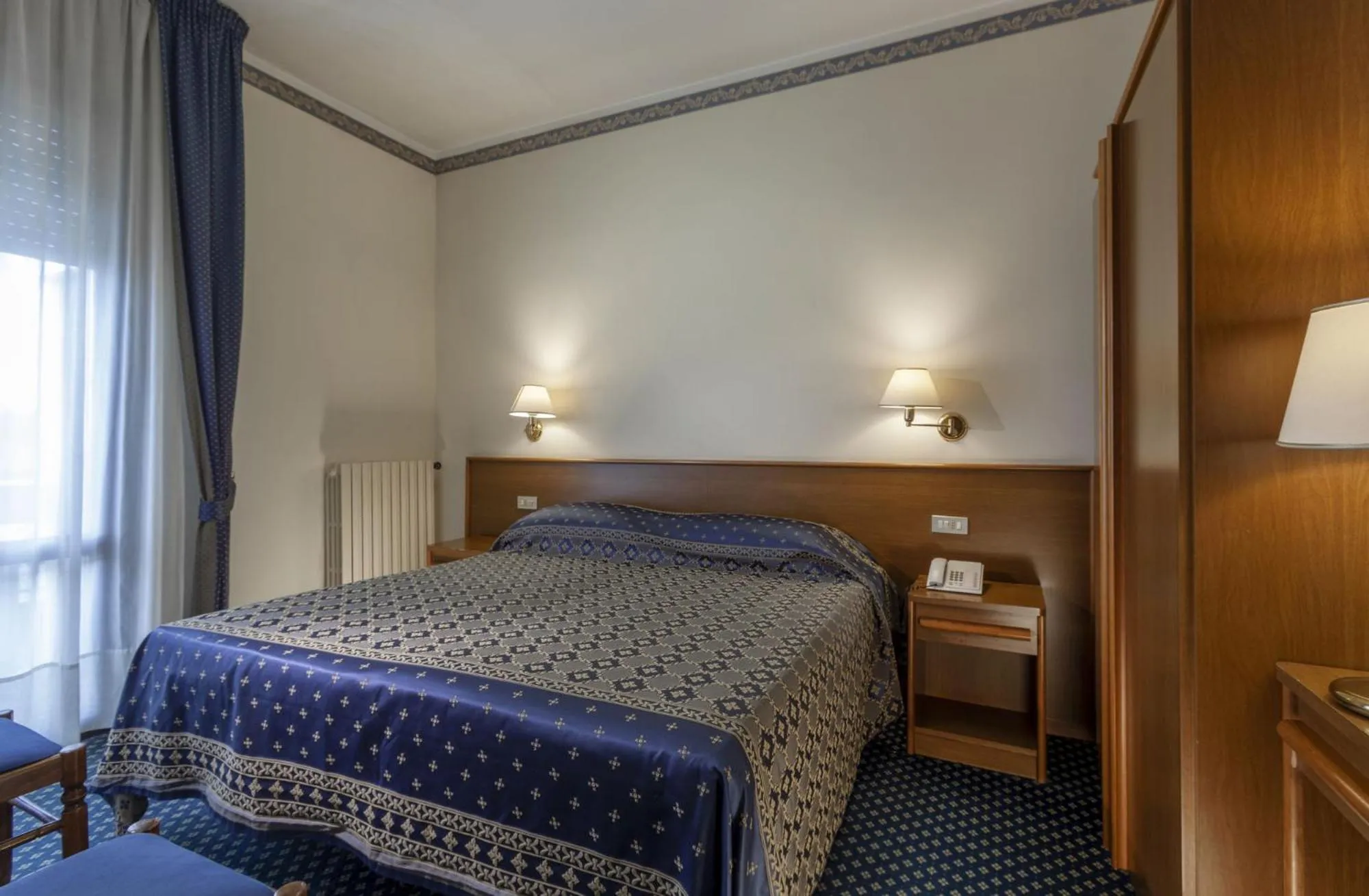 Bed in Hotel Firenze