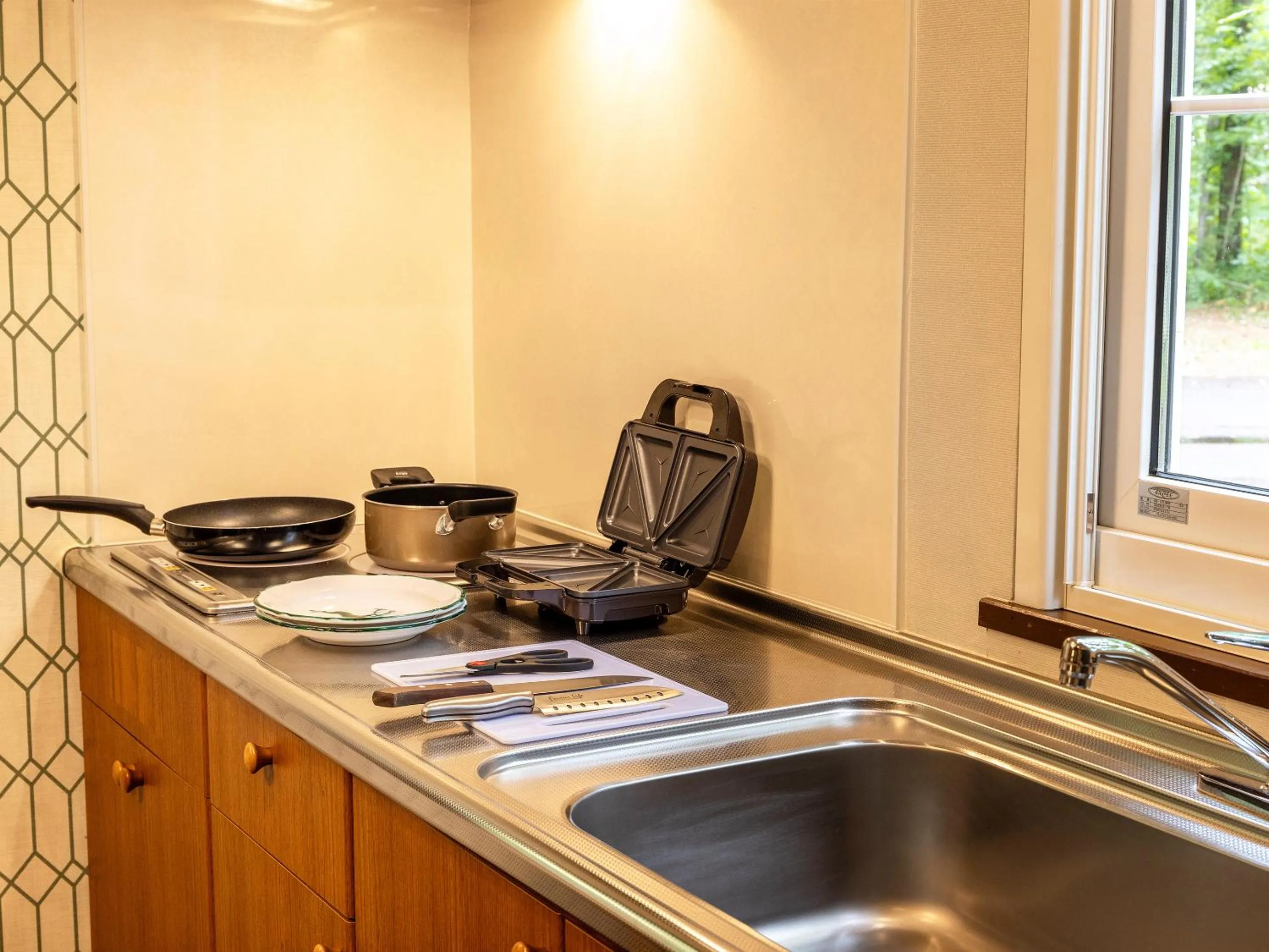 Kitchen or kitchenette in Tokachi Nakasatsunai Glamping Resort Feriendorf