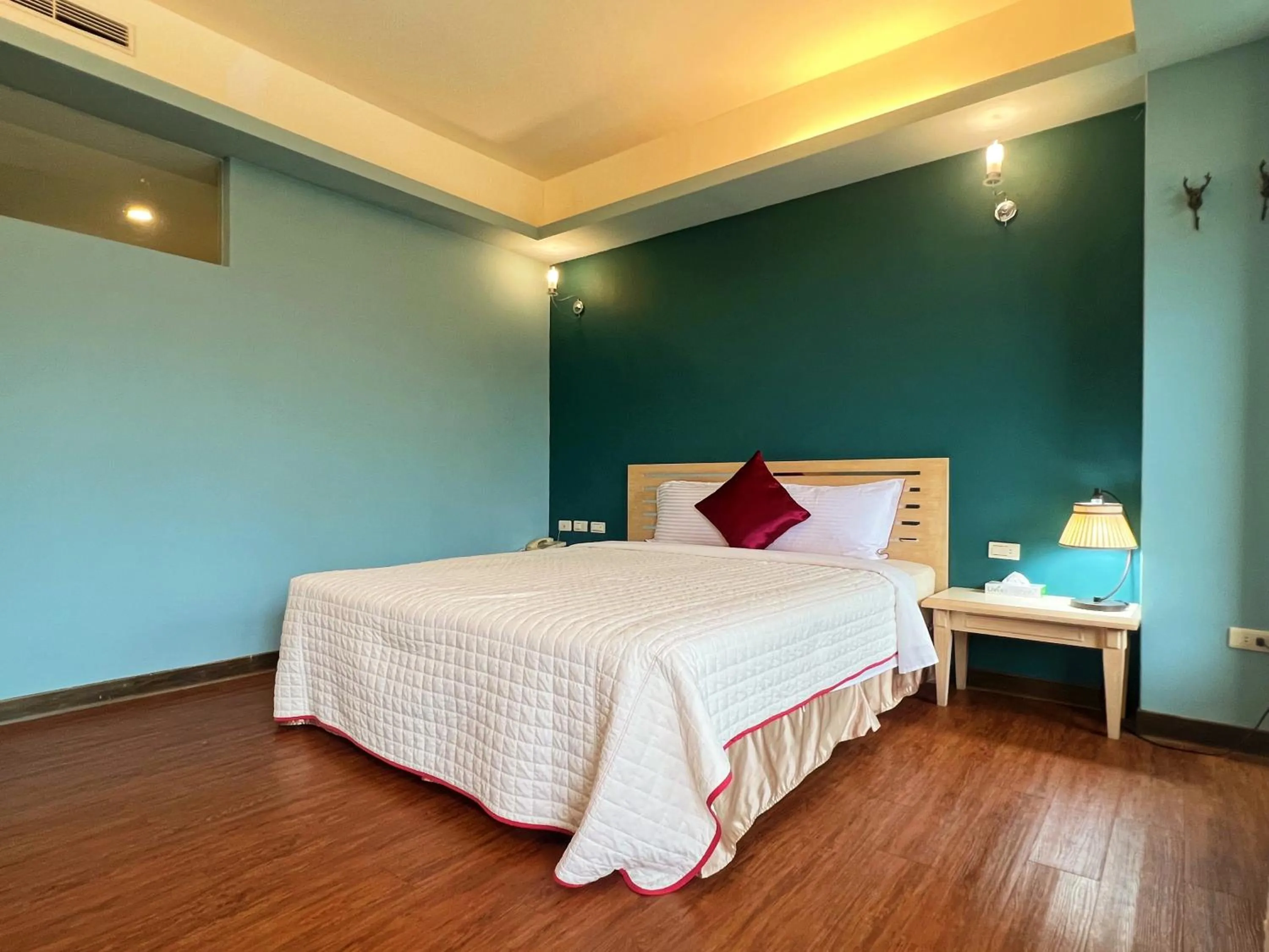 Bed in 墾丁茉莉民宿