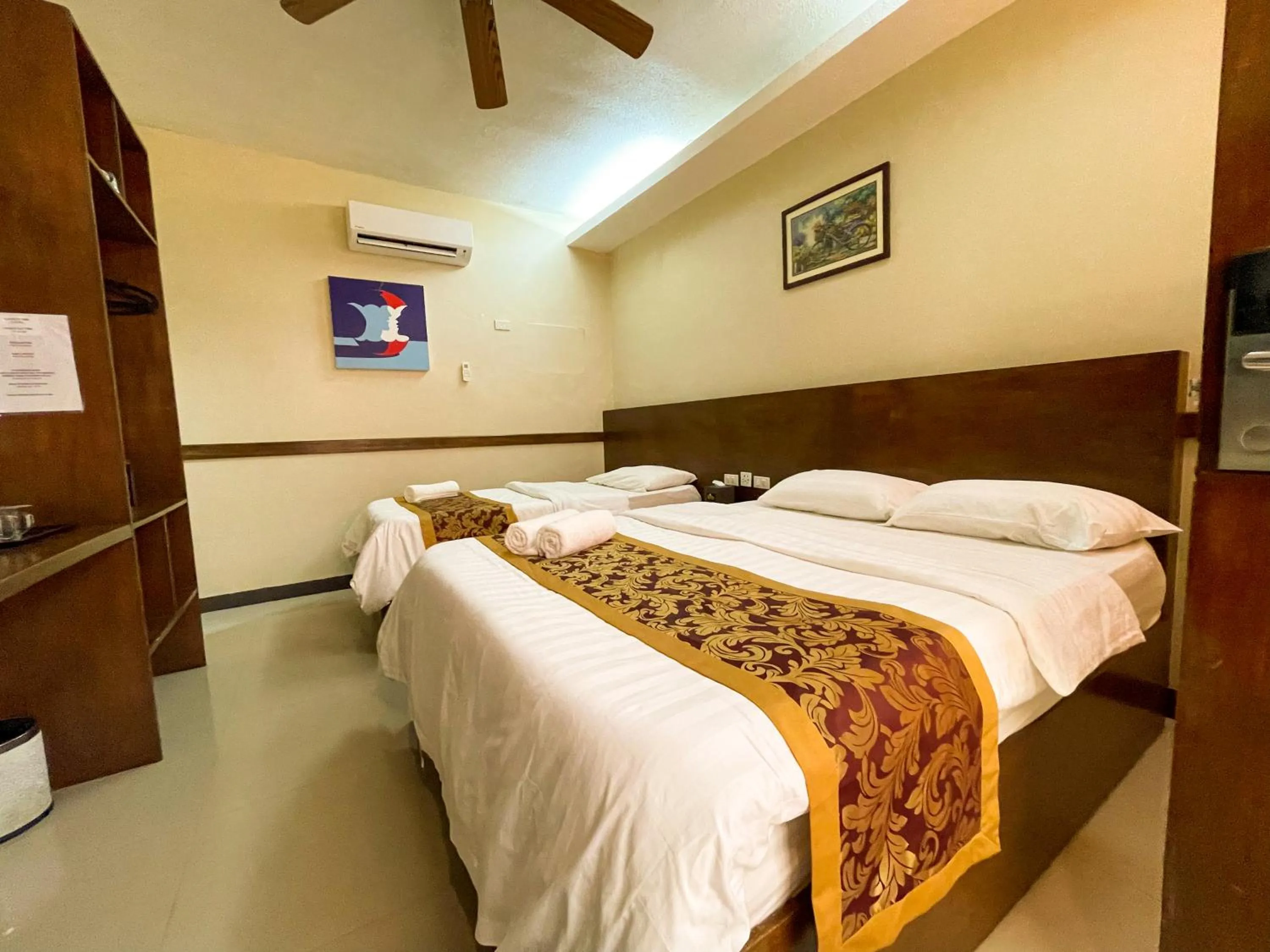 Bed in Casa Marco Suites Puerto Galera powered by Cocotel