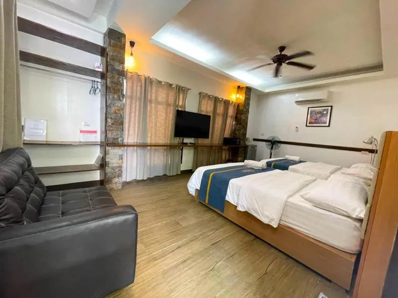 Photo of the whole room, Bed in Casa Marco Suites Puerto Galera powered by Cocotel