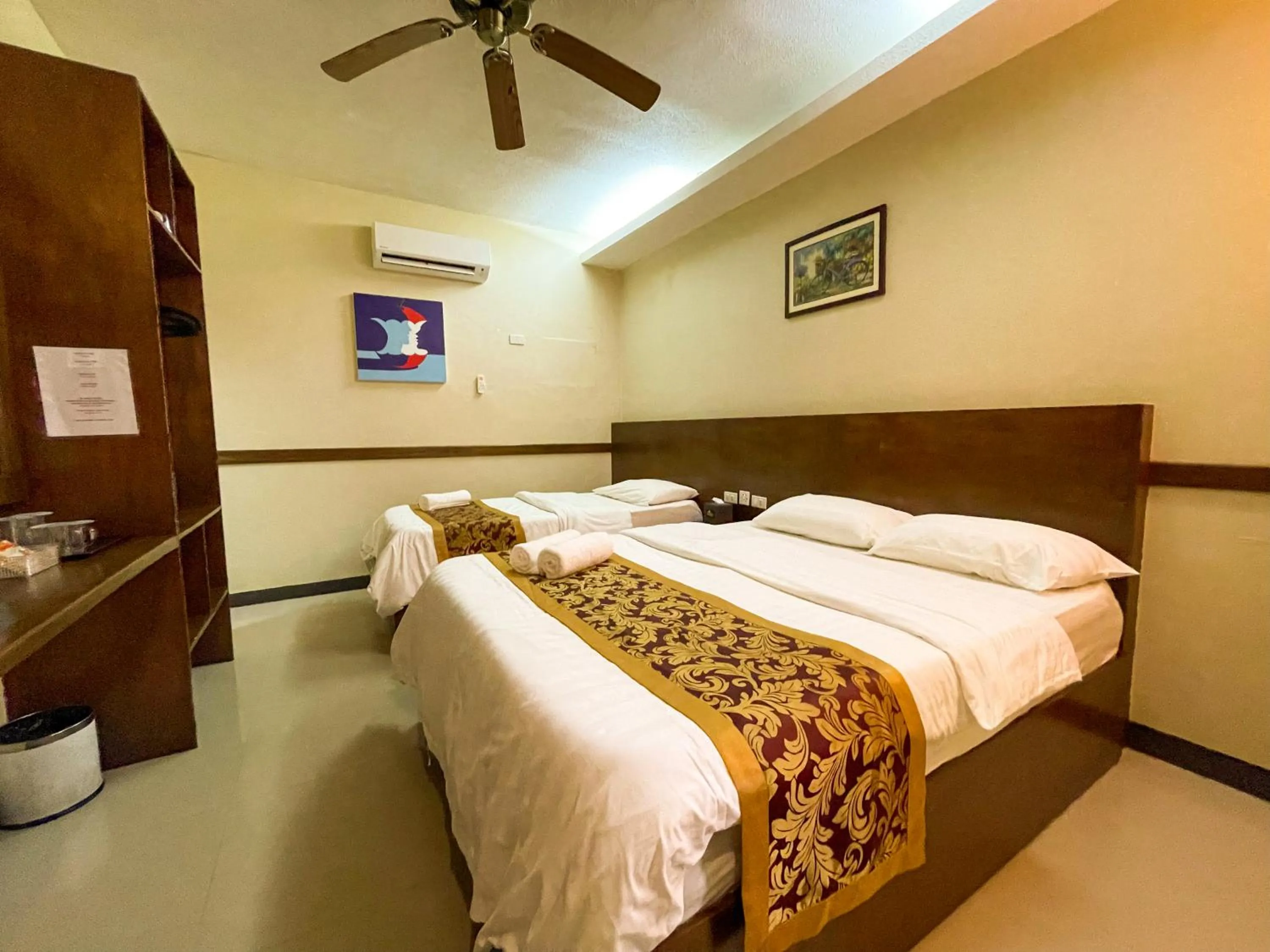 Bed in Casa Marco Suites Puerto Galera powered by Cocotel