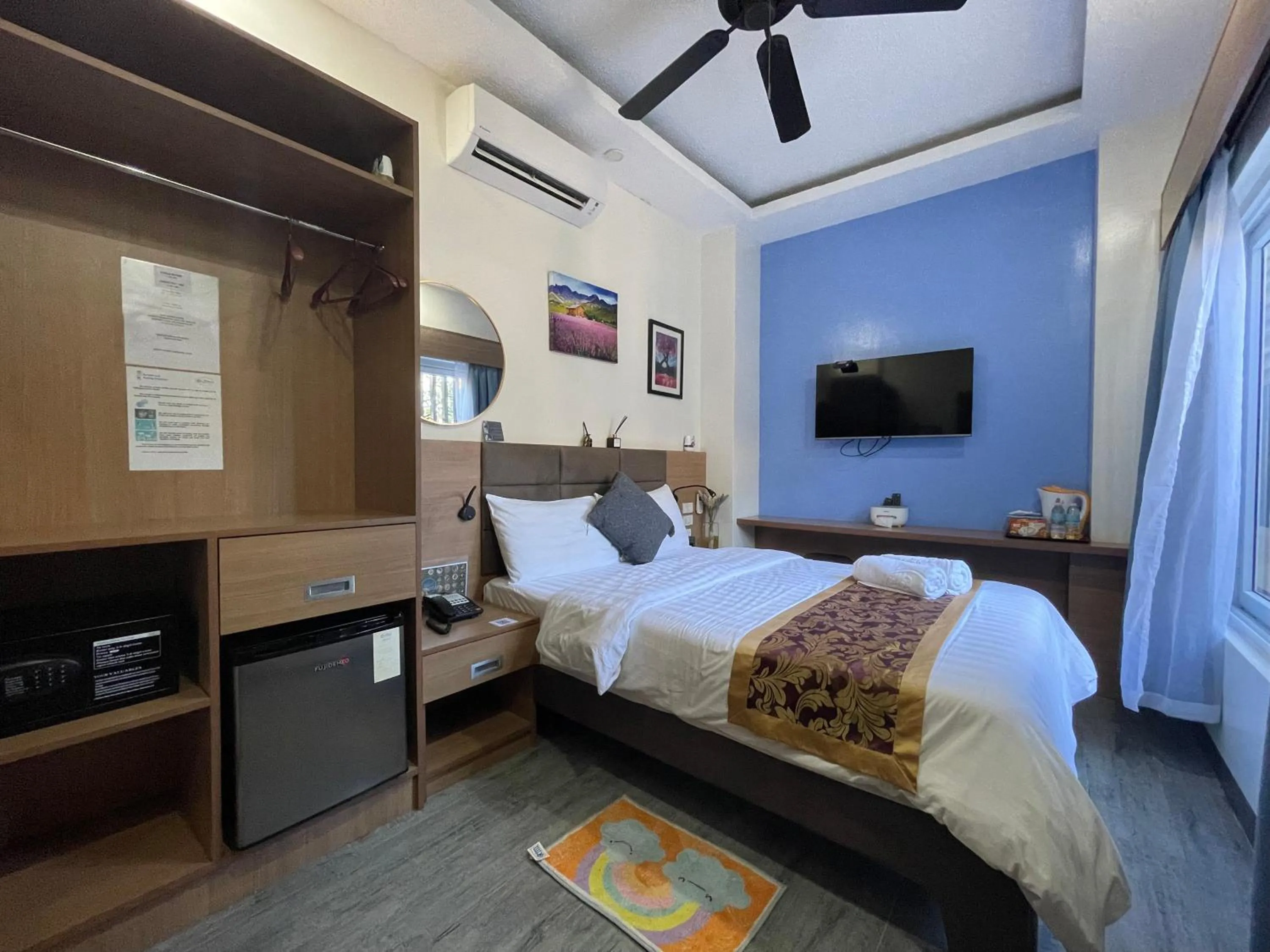 Bed in Casa Marco Suites Puerto Galera powered by Cocotel