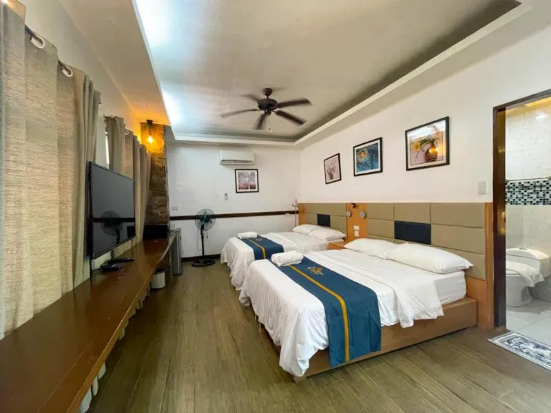 Bed in Casa Marco Suites Puerto Galera powered by Cocotel
