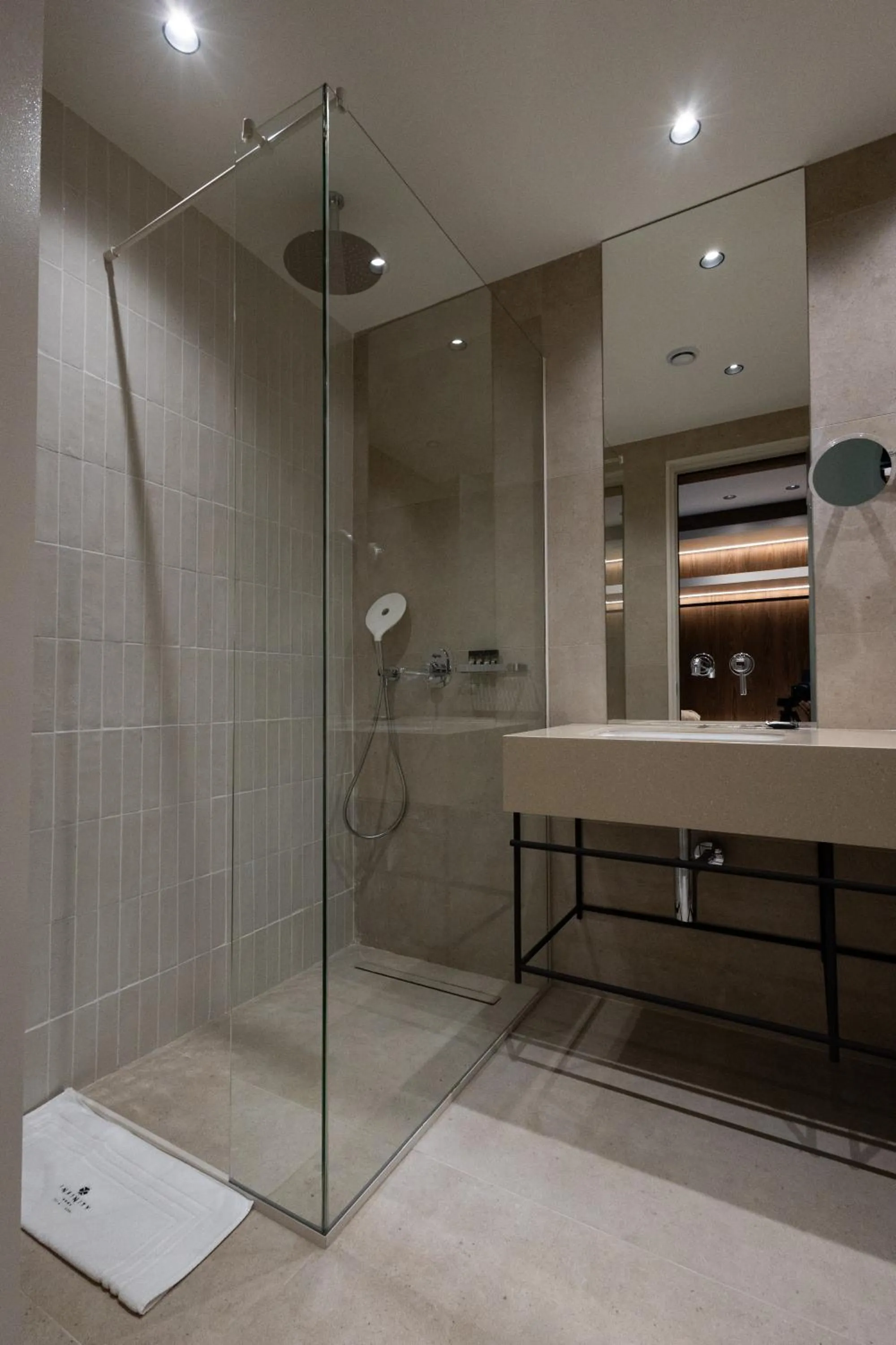 Shower in Infinity Hotel & More