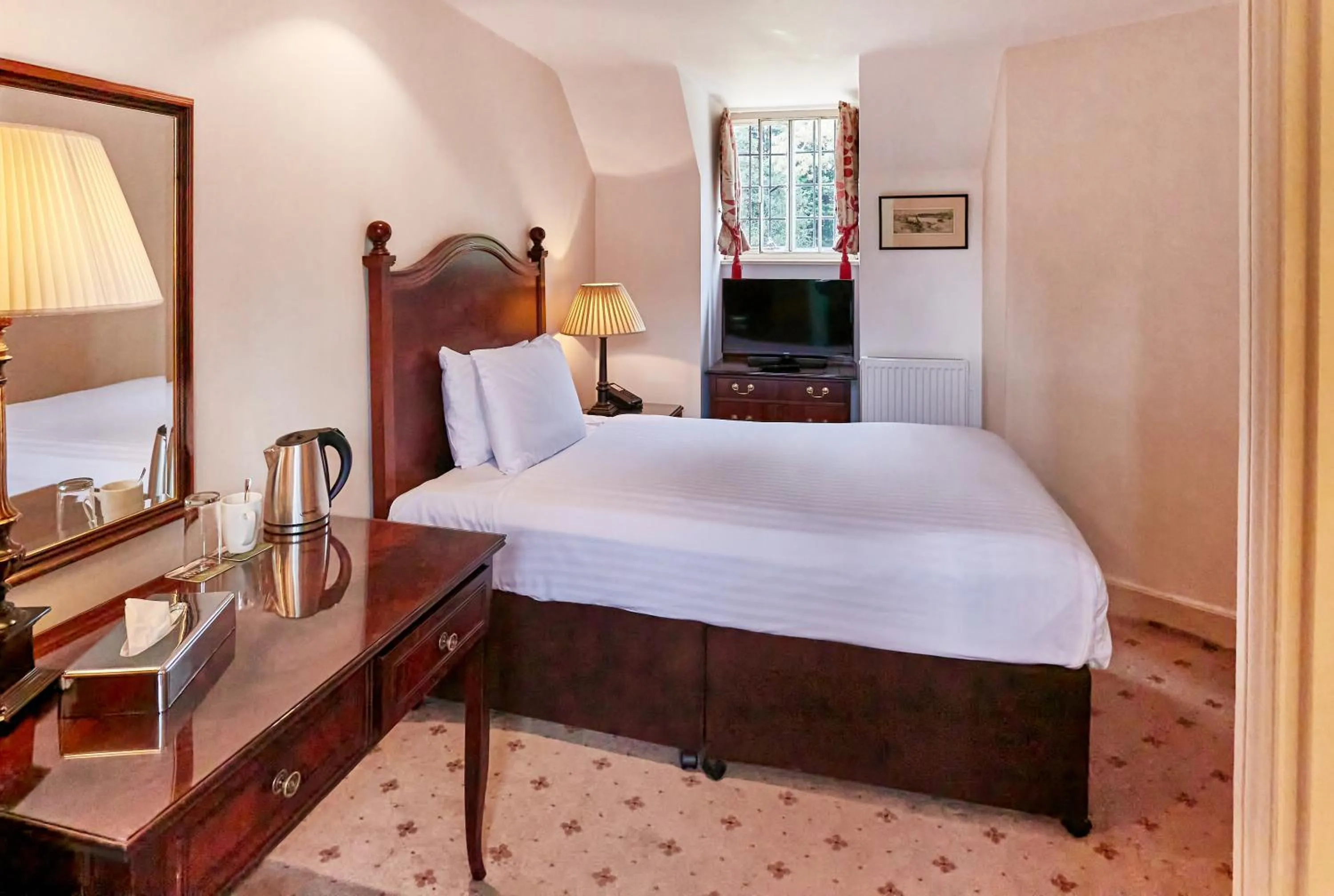 Bed in Flitwick Manor Hotel