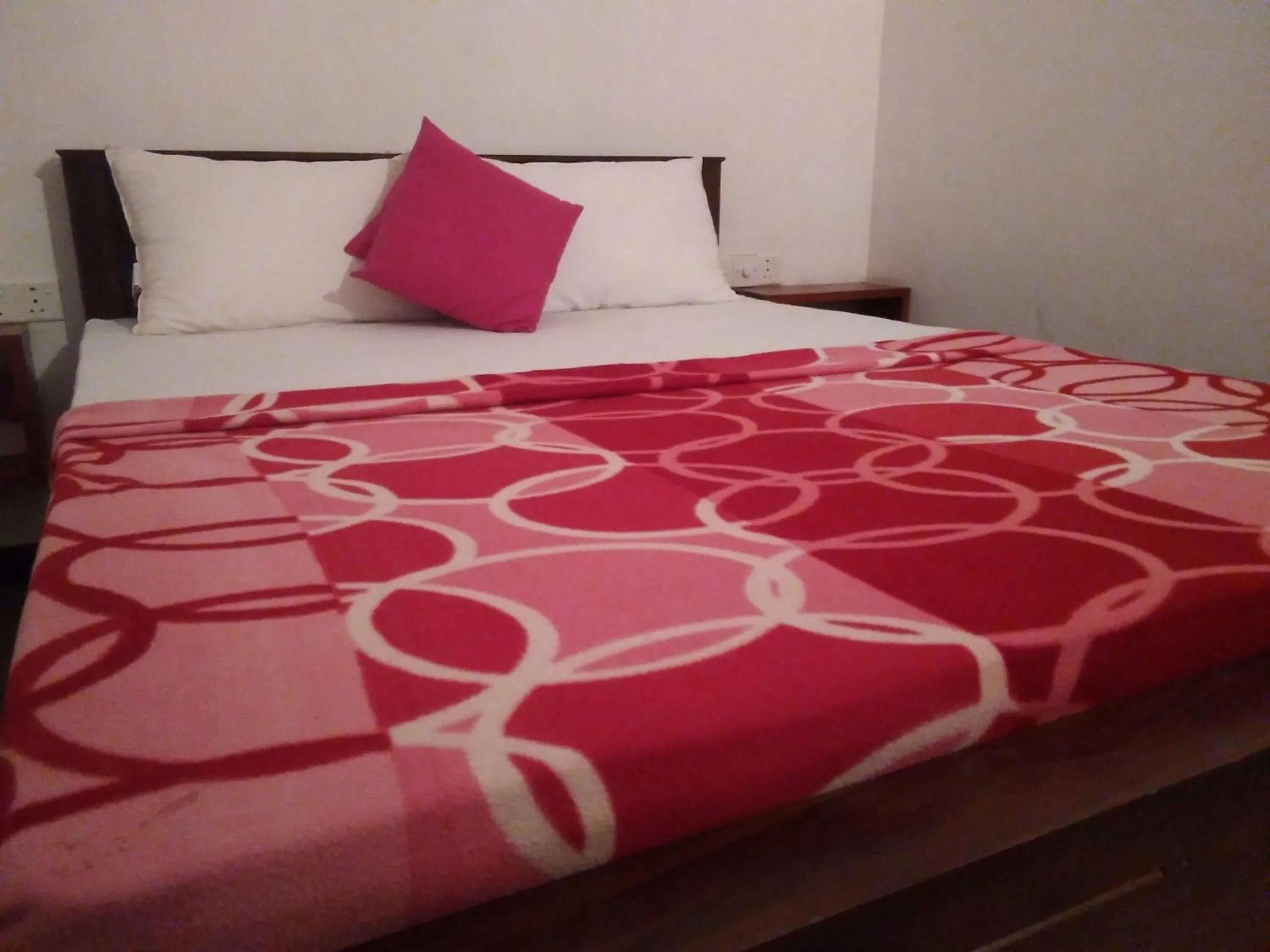 Bed in THE NEVANS SIGIRIYA