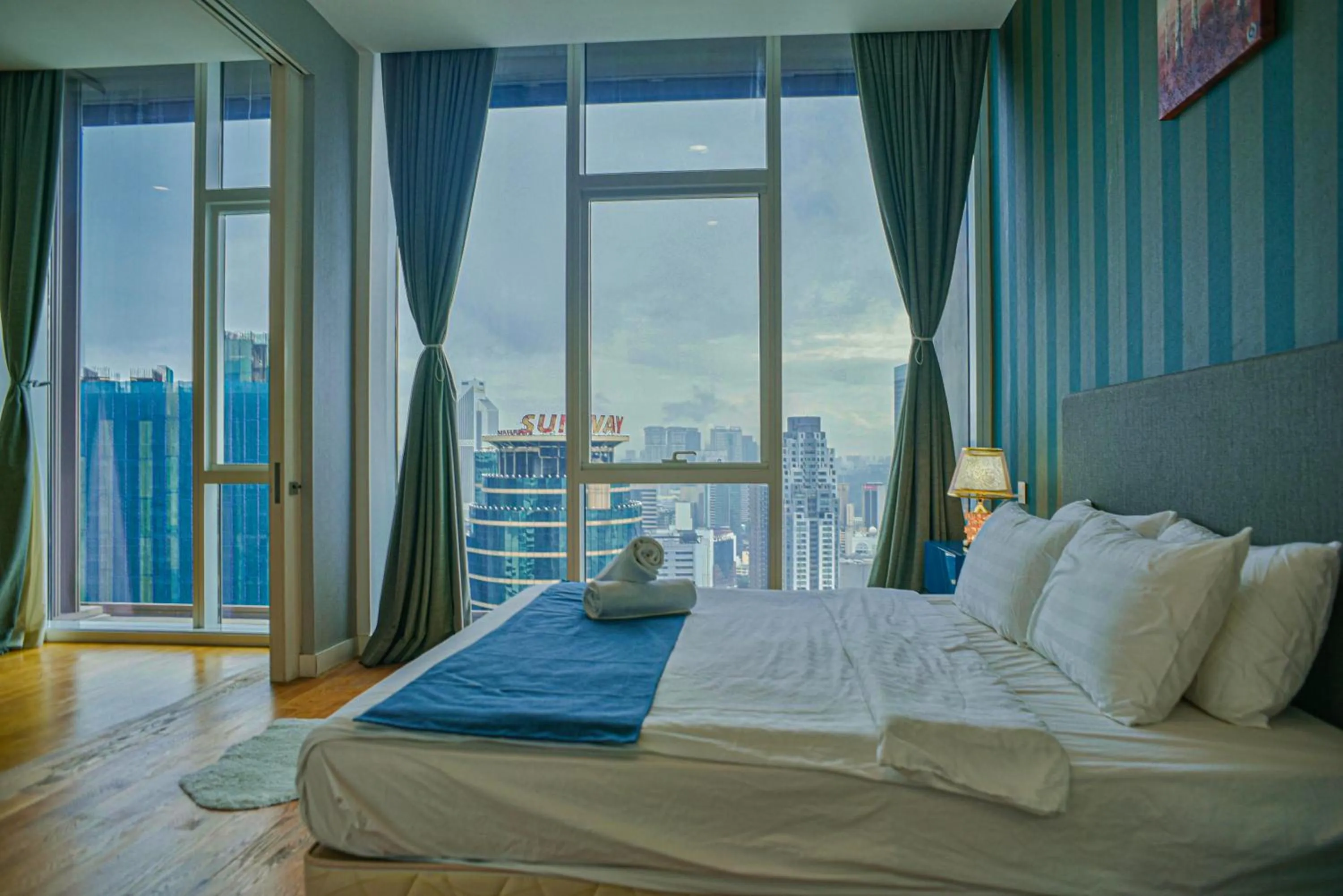 Bed in SKYWARD SUITES at Platinum KLCC