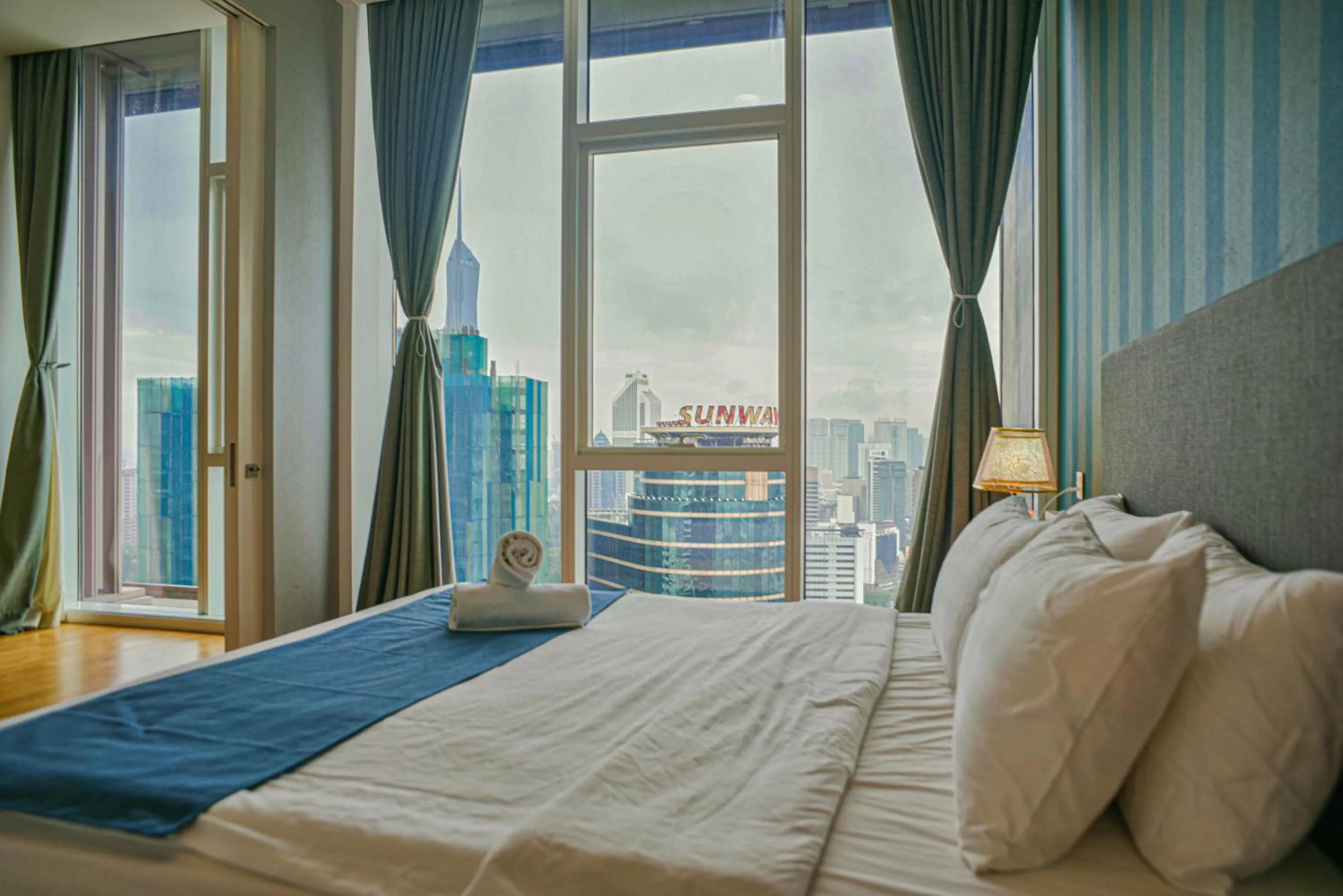 Bed in SKYWARD SUITES at Platinum KLCC