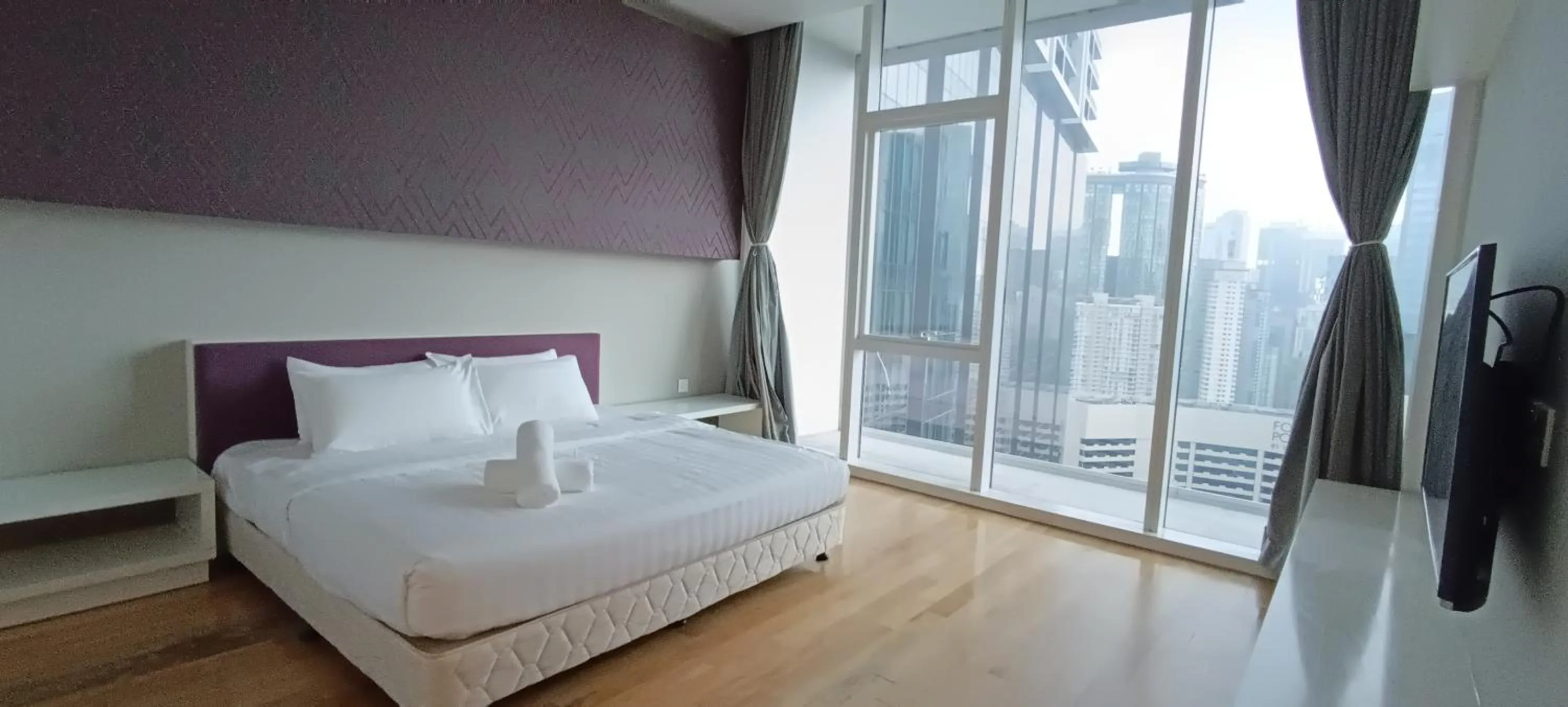 Bed in SKYWARD SUITES at Platinum KLCC