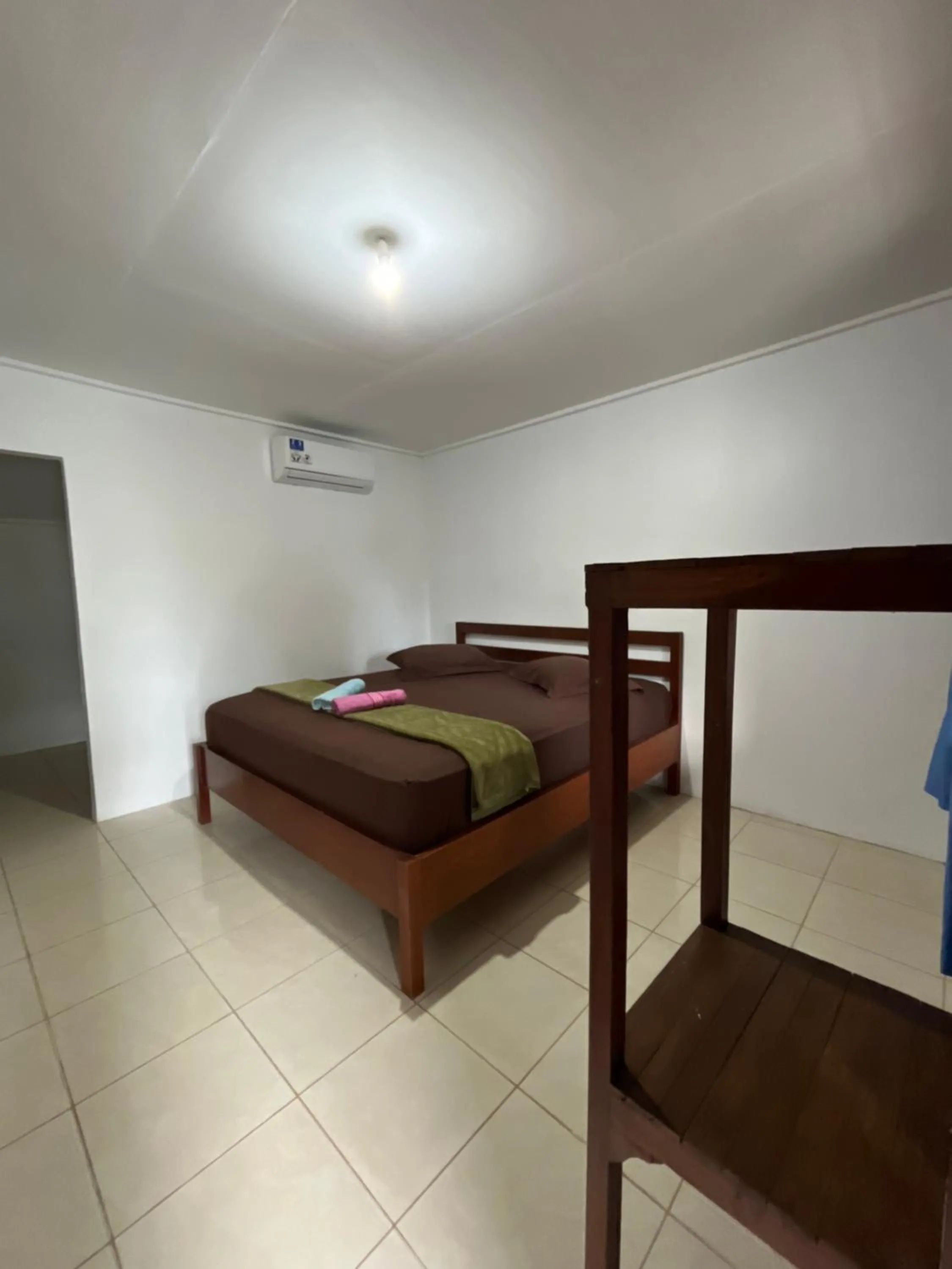 Bed in Olala Bungalows and Restaurant