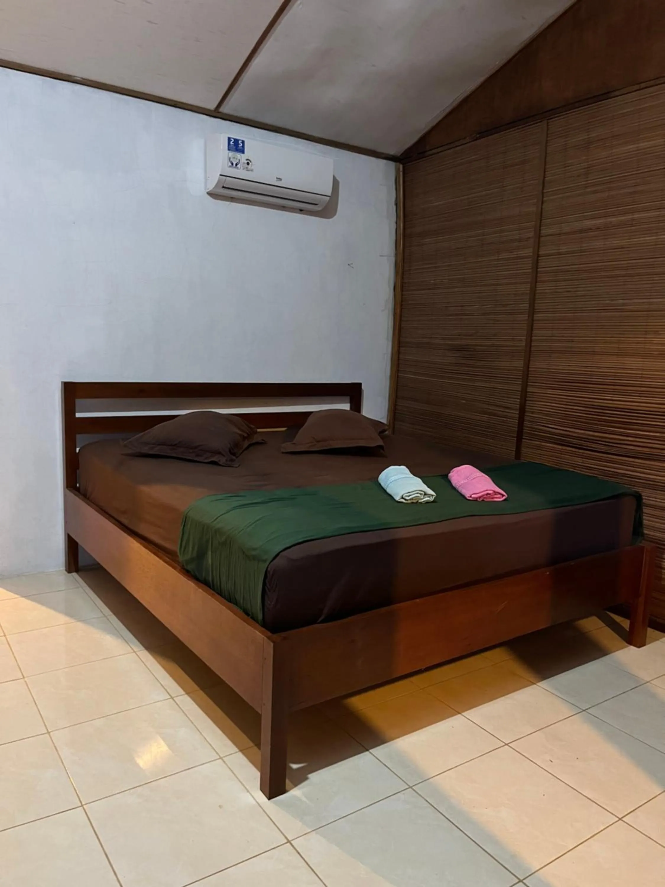 Bed in Olala Bungalows and Restaurant