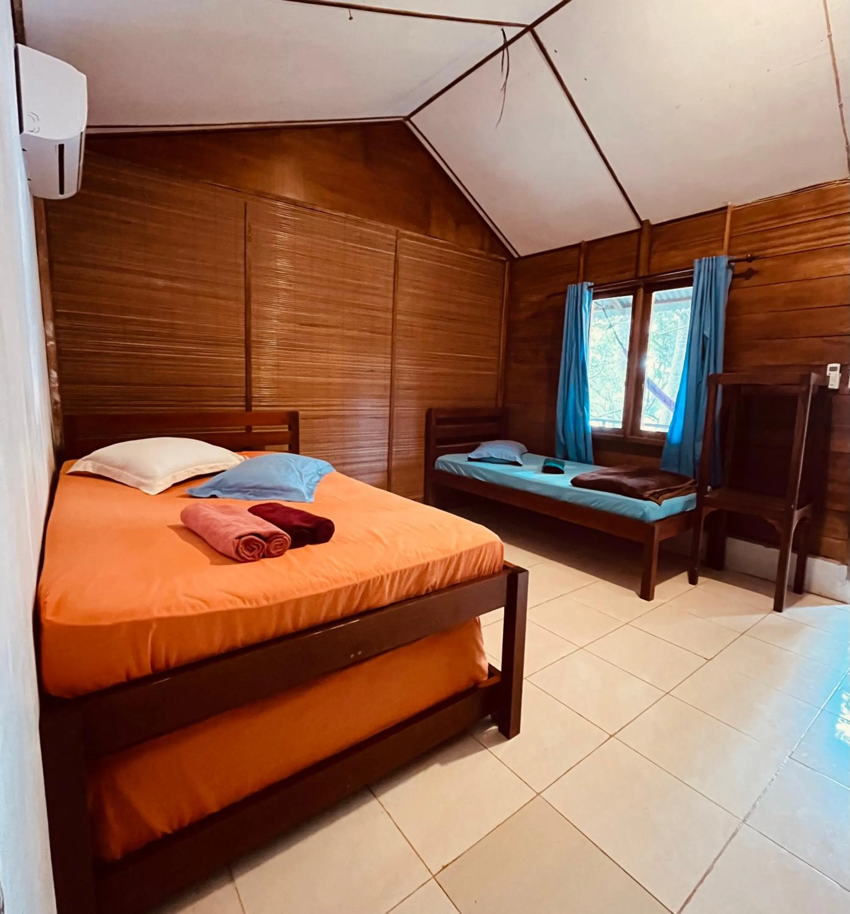 Bed in Olala Bungalows and Restaurant