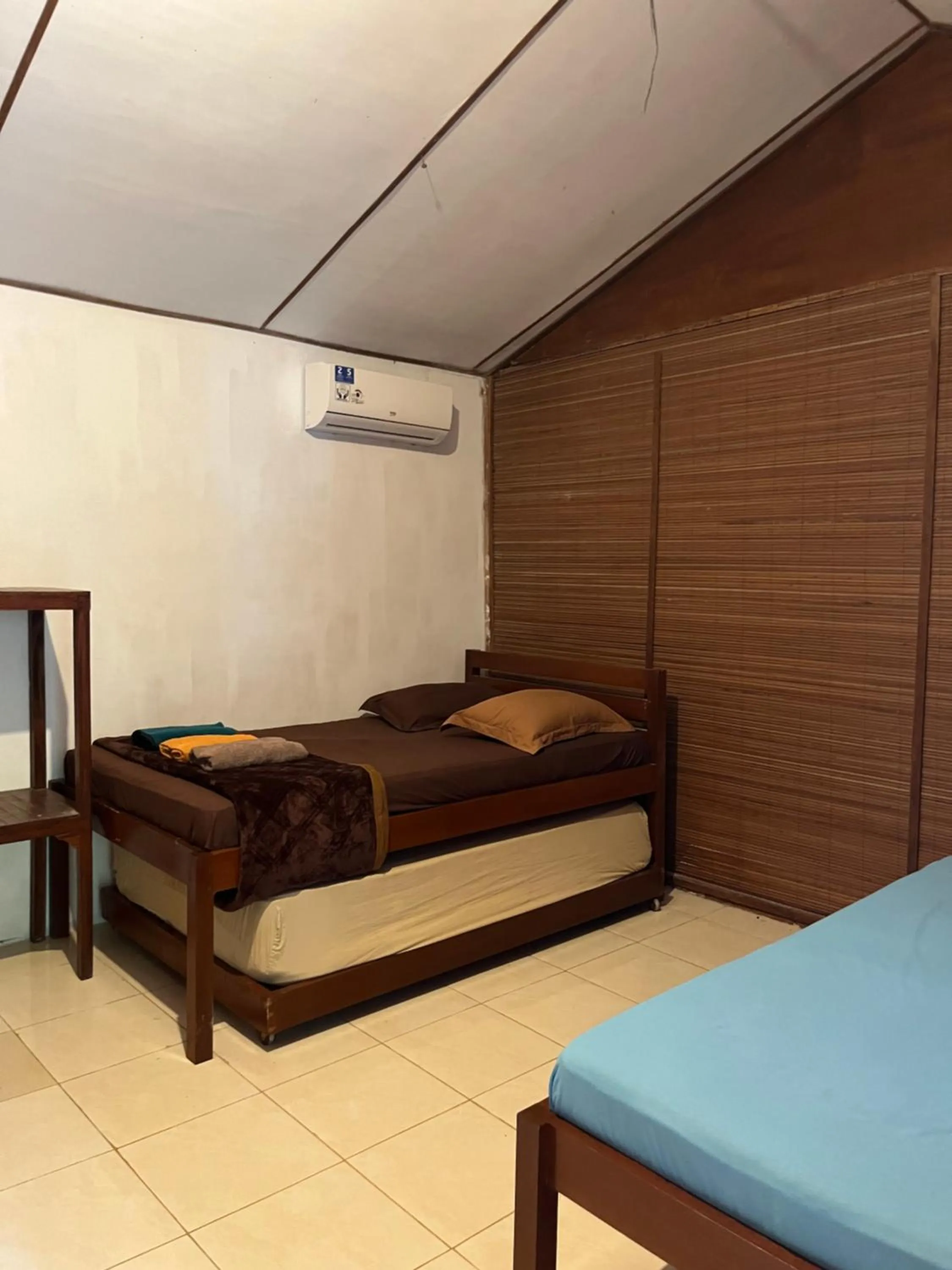 Bed in Olala Bungalows and Restaurant