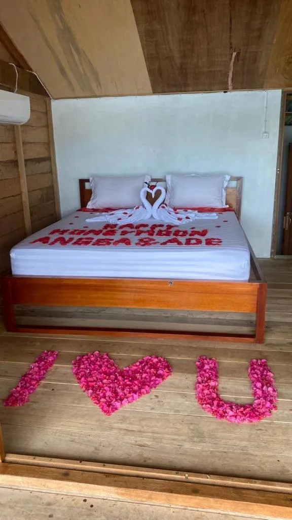 Bed in Olala Bungalows and Restaurant