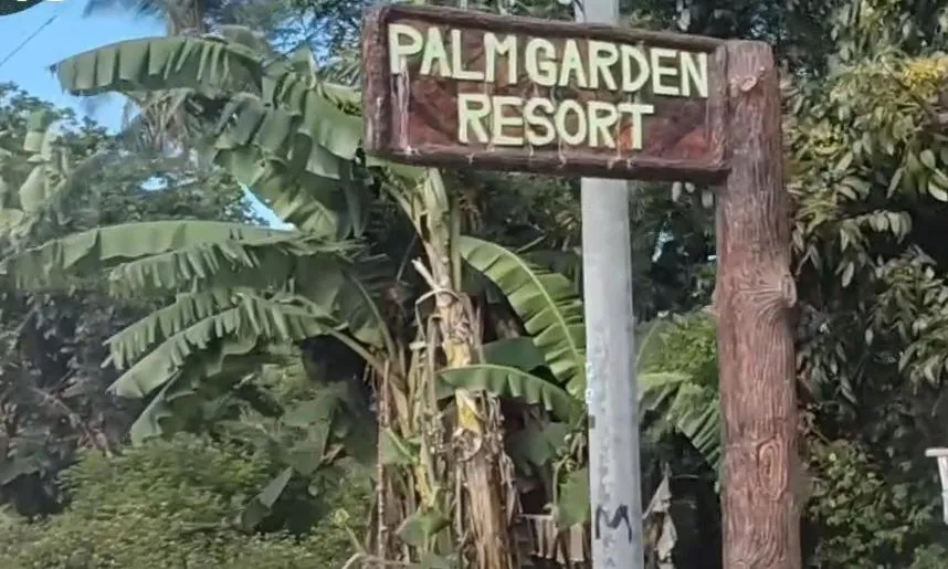 Property logo or sign in Palm Garden Resort