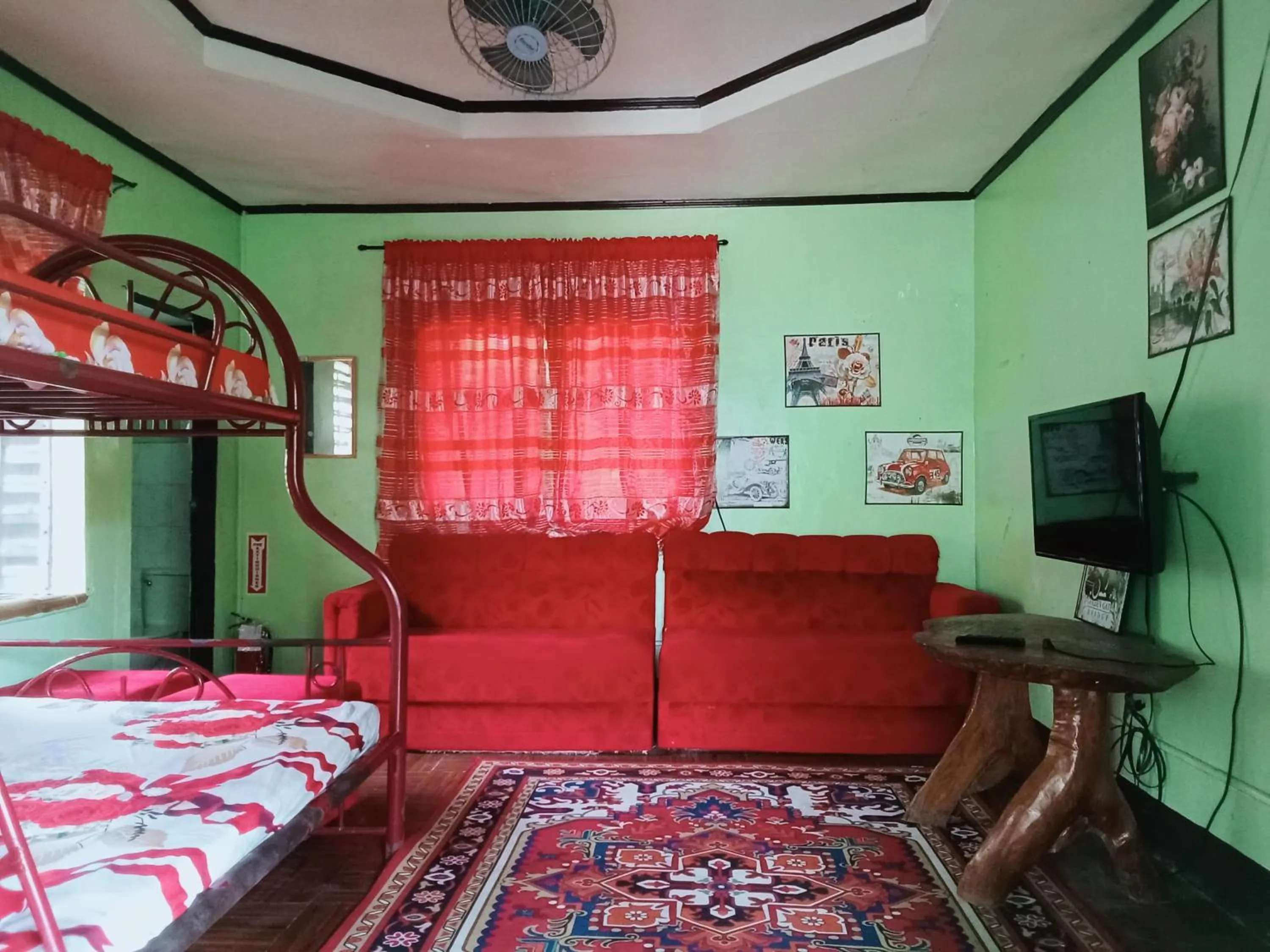 Communal lounge/ TV room, Bed in Palm Garden Resort