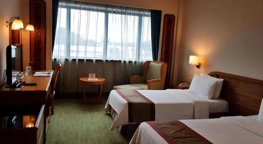 Bed in The CentrePoint Hotel