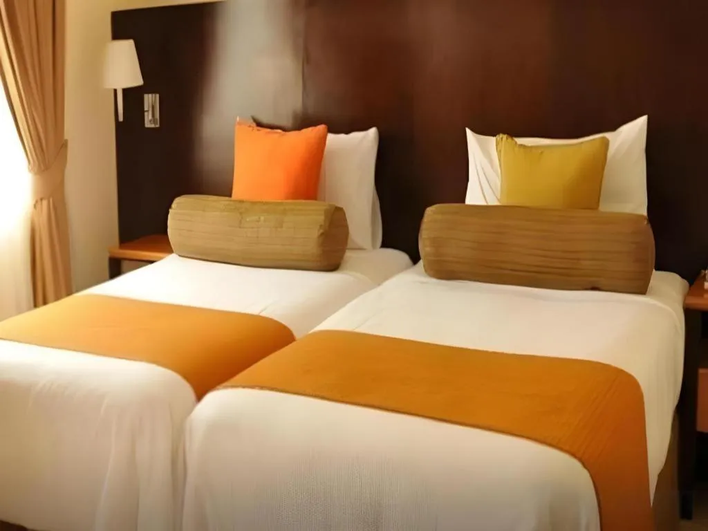 Bed in Pontefino Hotel and Residences