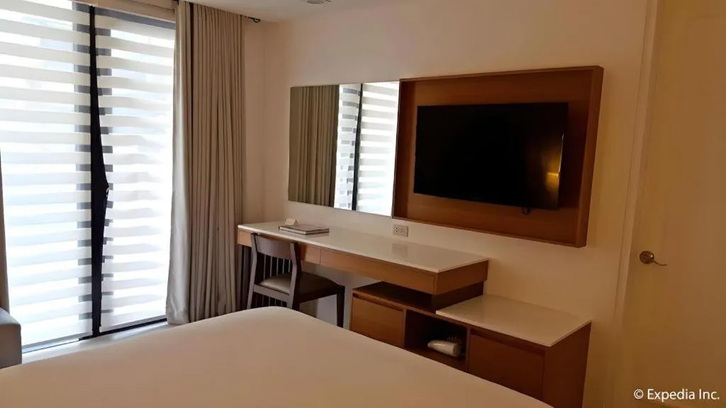 Bed in Pontefino Hotel and Residences
