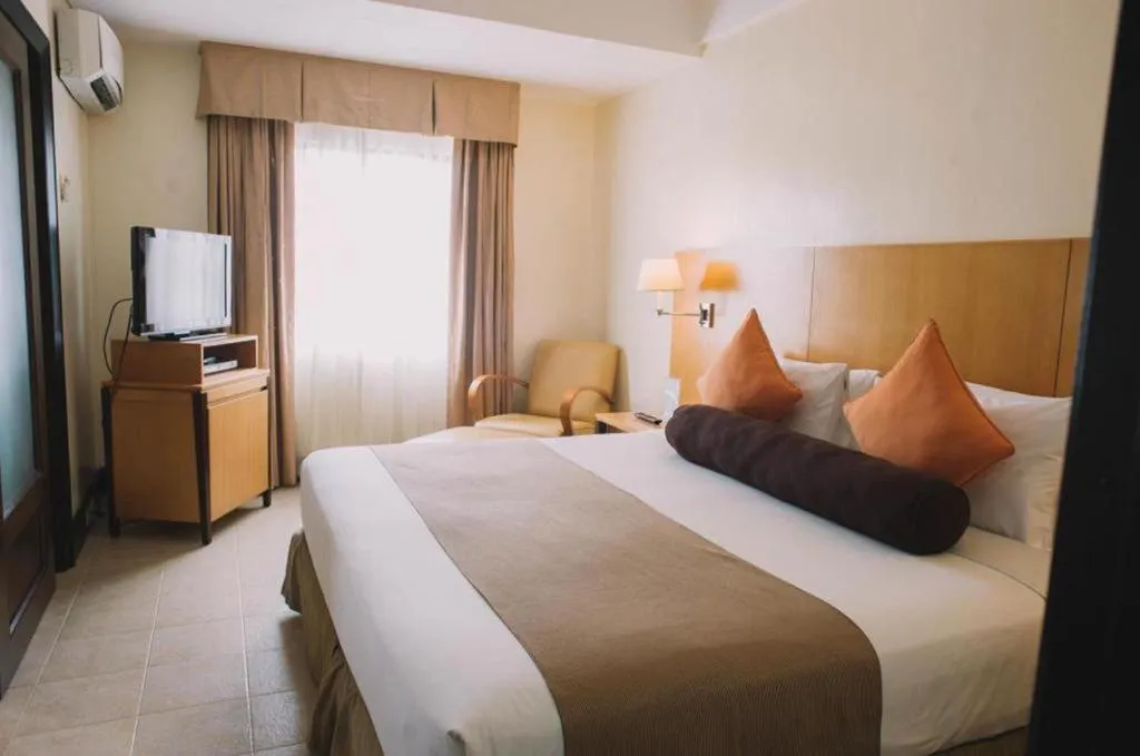 Bed in Pontefino Hotel and Residences