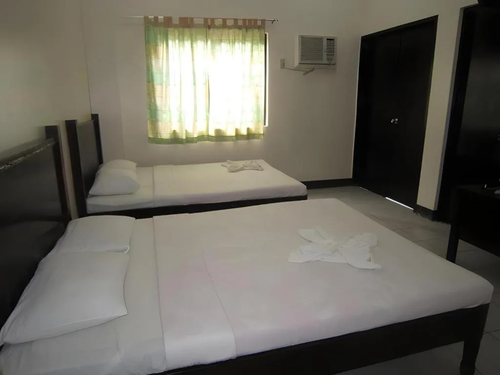 Bed in Boracay Travelodge Beach Resort