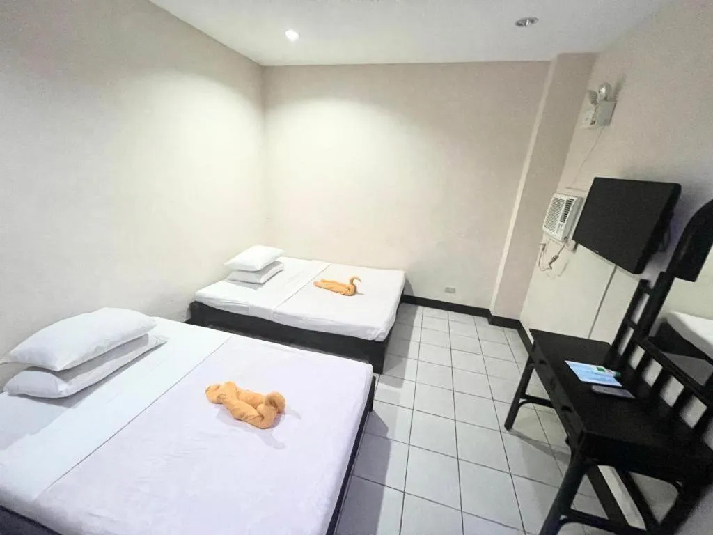 Bed in Boracay Travelodge Beach Resort