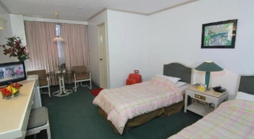 Bed in Hotel Supreme