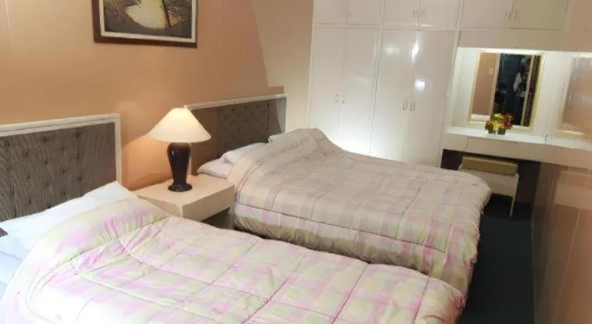 Bed in Hotel Supreme