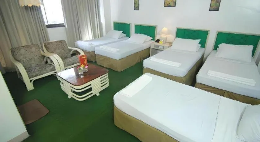 Bed in Hotel Supreme