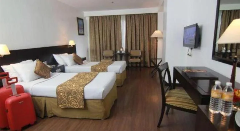 Bed in Hotel Supreme Convention Plaza