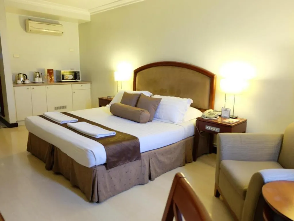 Bed in Hotel Supreme Convention Plaza