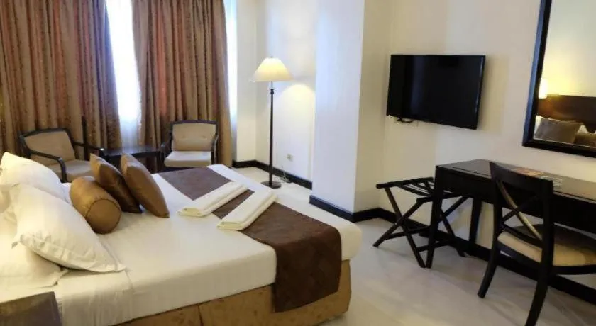 Bed in Hotel Supreme Convention Plaza