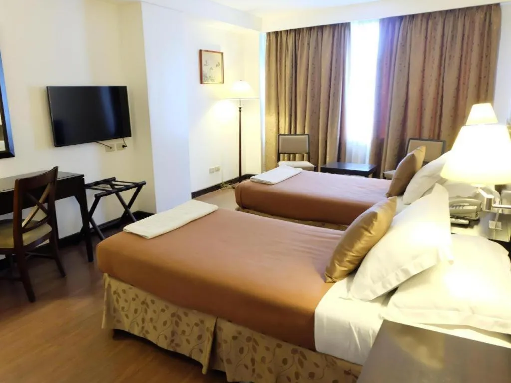 Bed in Hotel Supreme Convention Plaza