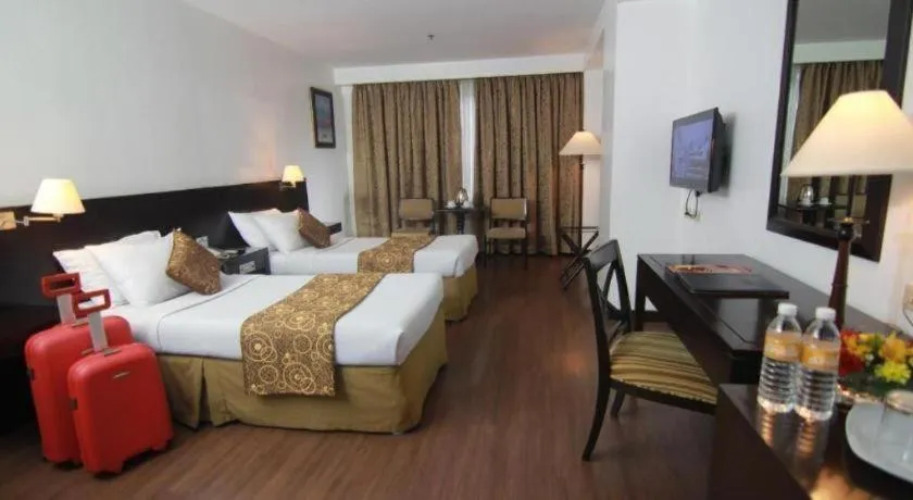 Bed in Hotel Supreme Convention Plaza