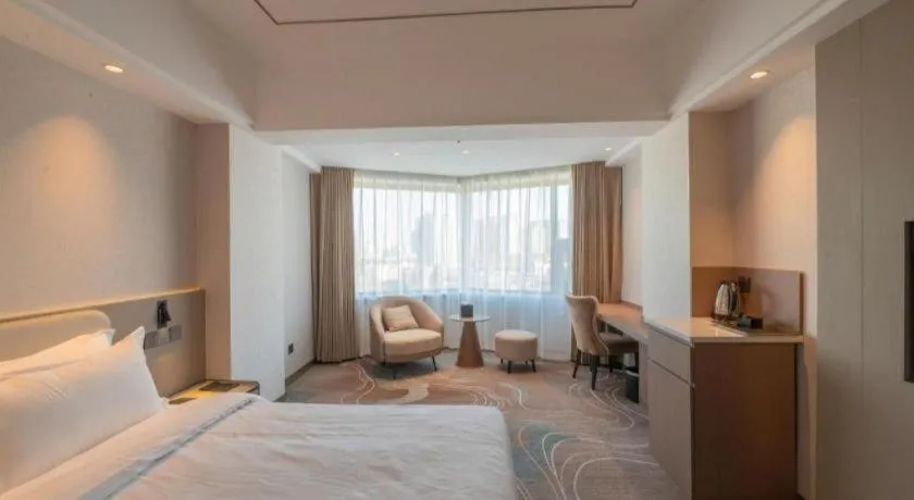 Bed in Xian Empress Hotel