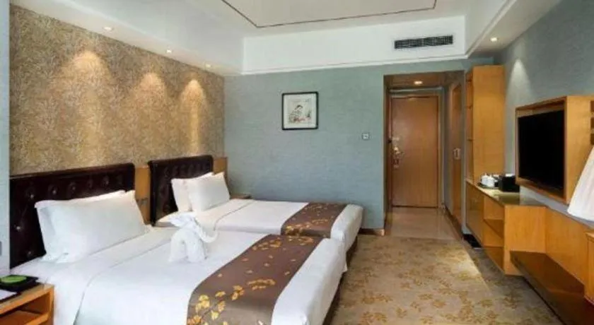 Bed in Xian Empress Hotel