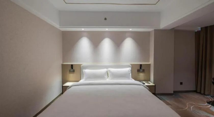 Bed in Xian Empress Hotel