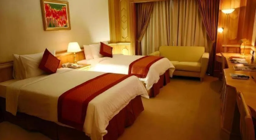 Bed in The Rizqun International Hotel